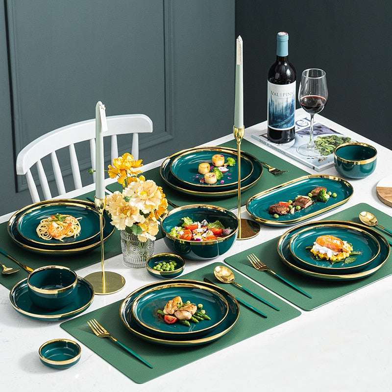 Luksusowy zestaw talerzy i misek ceramicznych z dekoracyjnym złotym paskiem